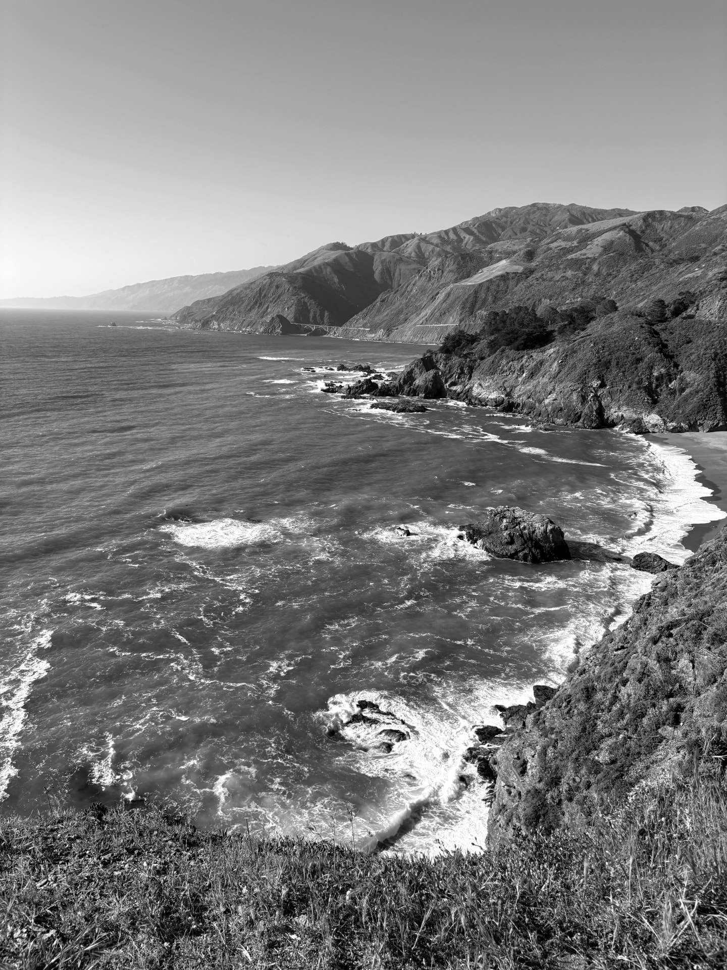 Wide view of the Big Sur coastline in black and white